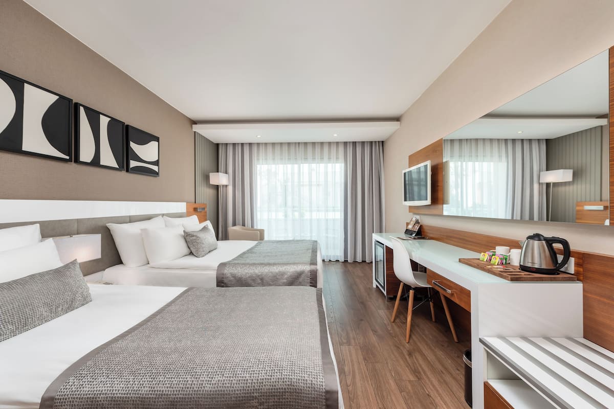 Premium bedding, minibar (free items), blackout drapes, soundproofing