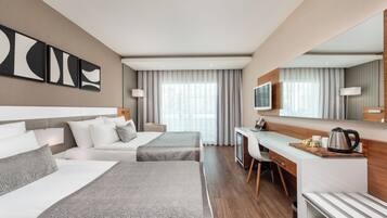 Roba de llit d'alta qualitat, minibar gratuït i cortines opaques