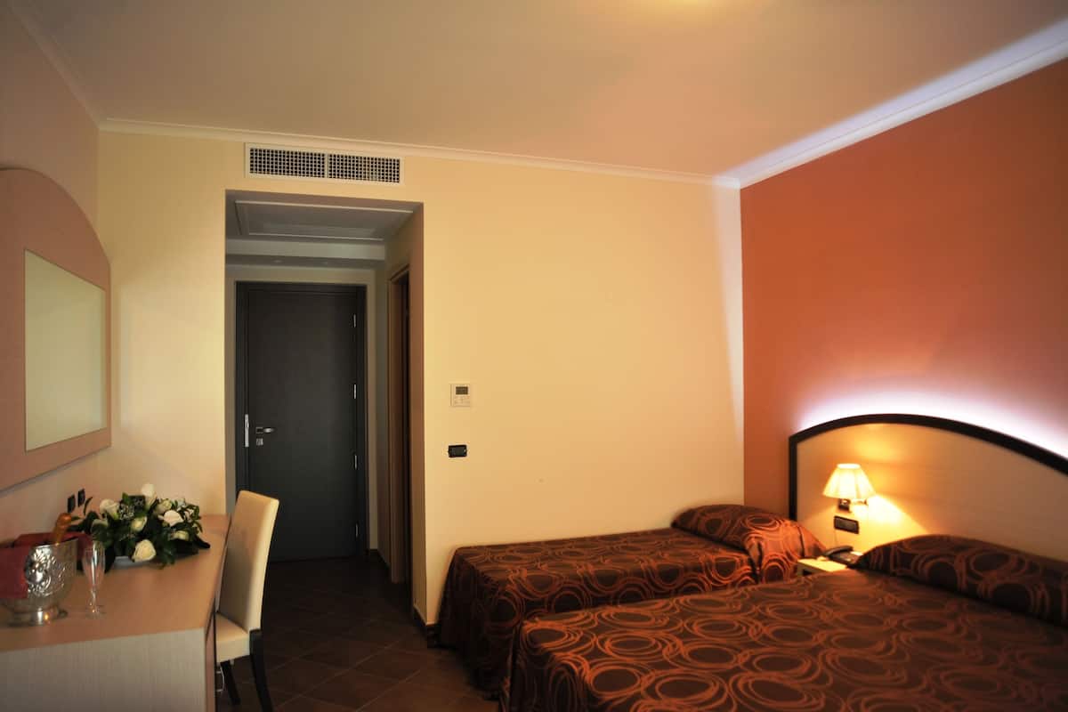 Italiaanse Frette-lakens, luxe beddengoed, een minibar
