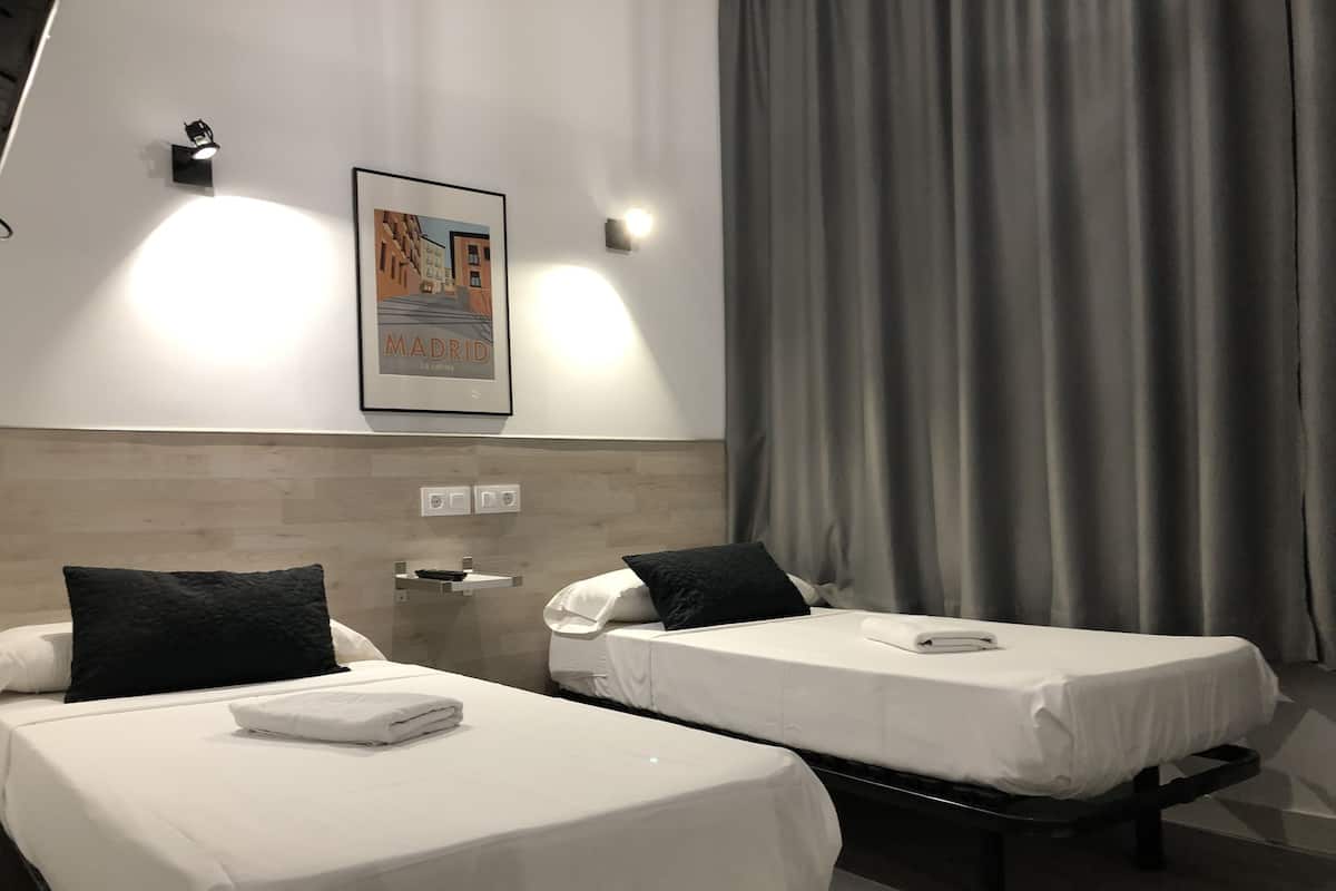 Twin Room | 1 bedroom, desk, blackout drapes, free WiFi