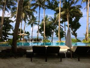 Outdoor pool, pool umbrellas, pool loungers