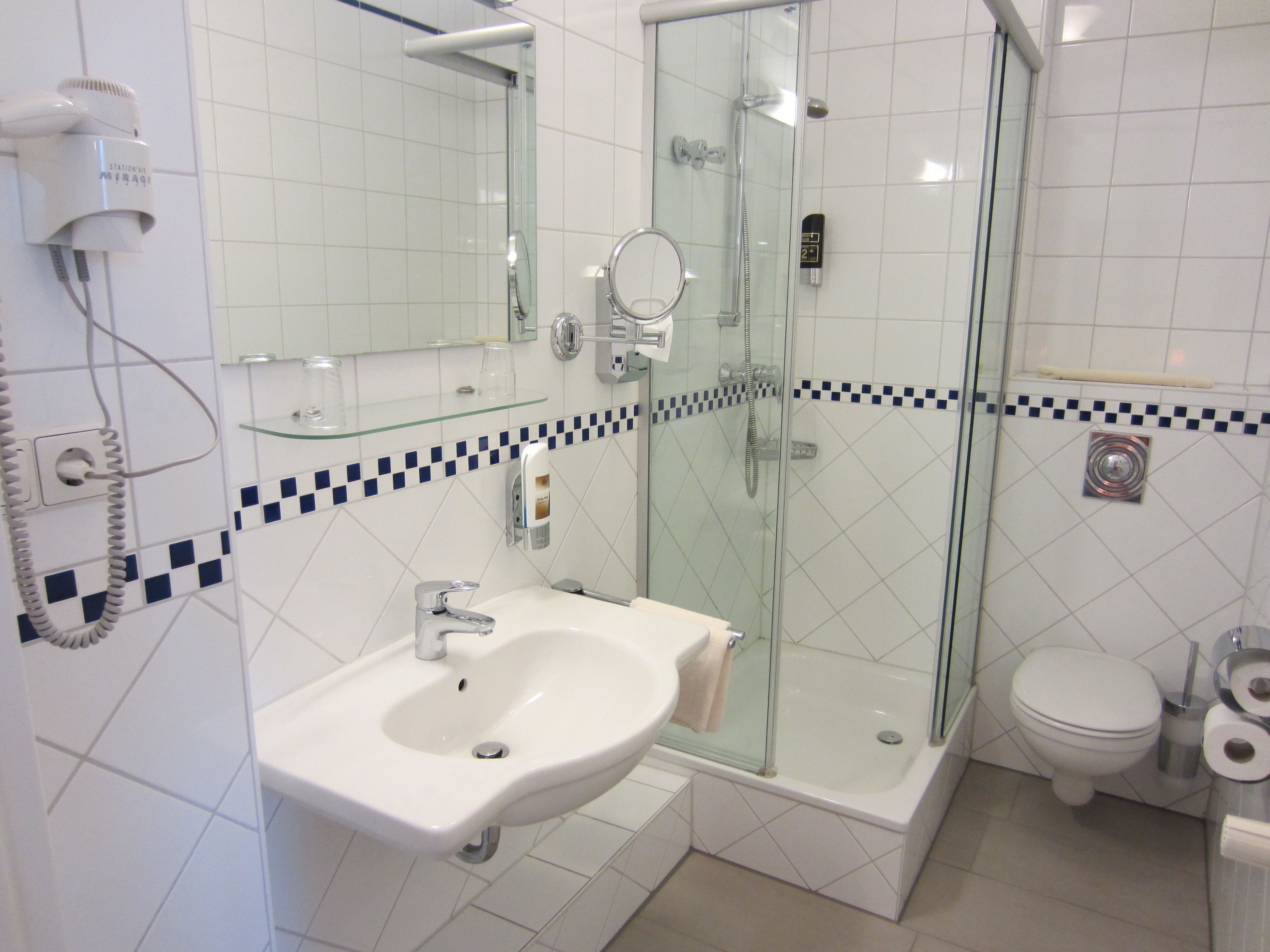 shower, free toiletries, hair dryer, towels