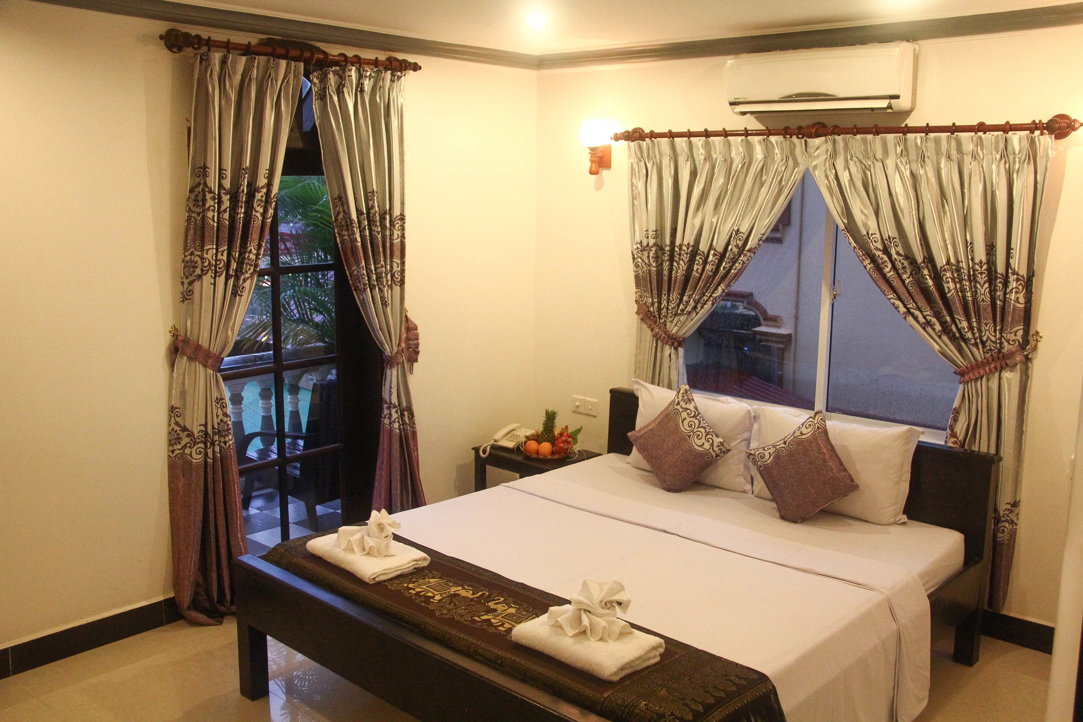 Deluxe Double Room | Free minibar items, in-room safe, desk, blackout curtains