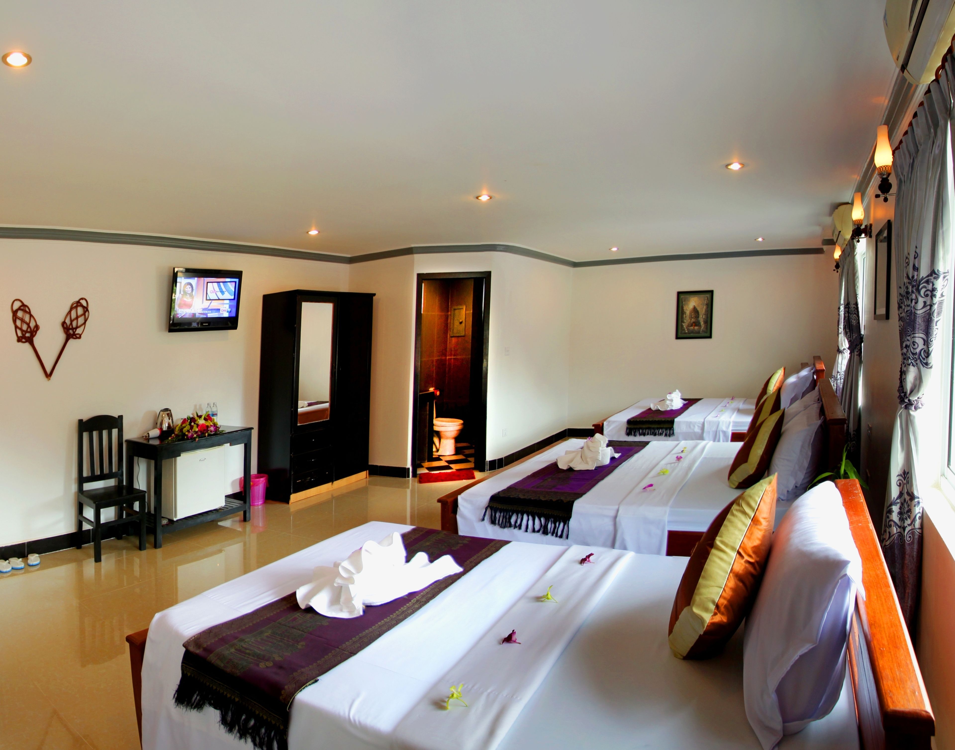 family room | 1 bedroom, free minibar items, in-room safe, desk