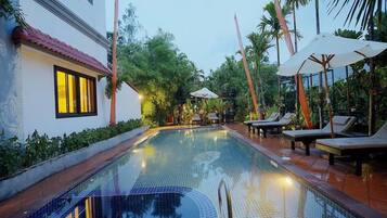 Outdoor pool, open 8 AM to 8 PM, pool umbrellas, sun loungers