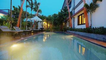 Outdoor pool, open 8 AM to 8 PM, pool umbrellas, sun loungers