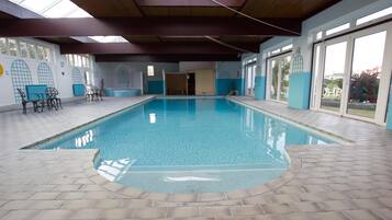 Indoor pool, open 8:00 AM to 8:00 PM, pool loungers