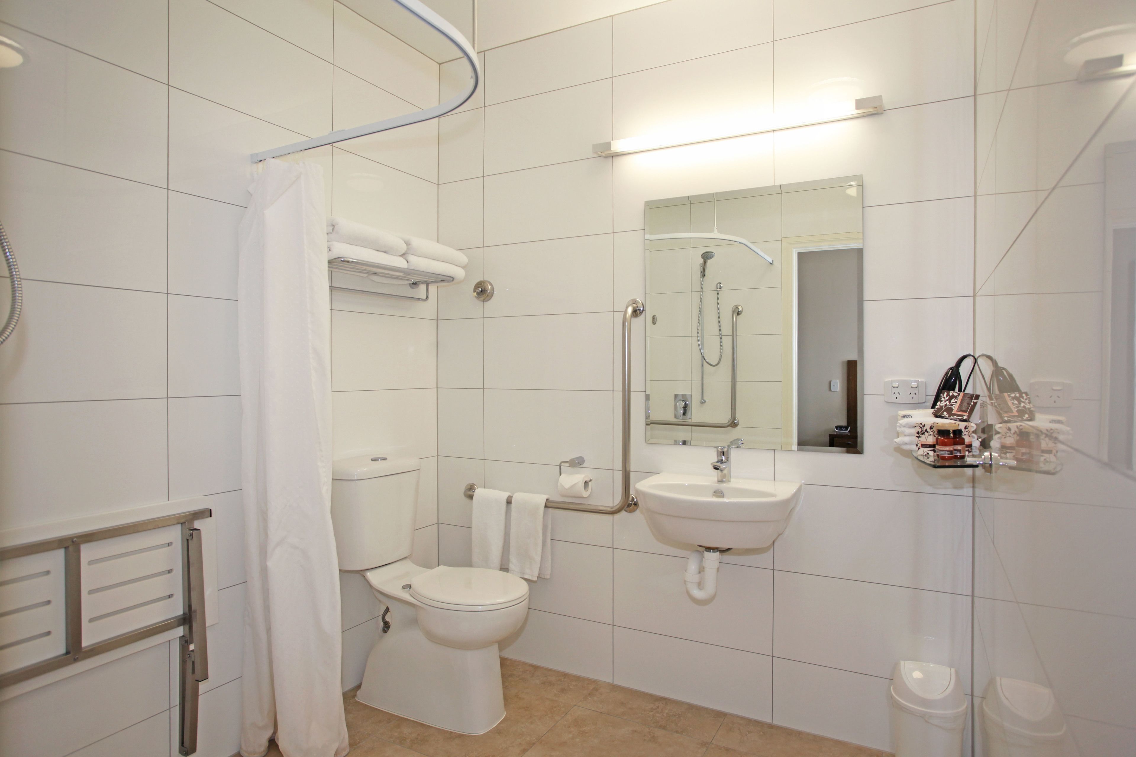 disabled access room | bathroom | shower, free toiletries, hair dryer, bathrobes