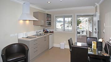 Apartment, 1 Bedroom | Living area | LCD TV, DVD player, iPod dock