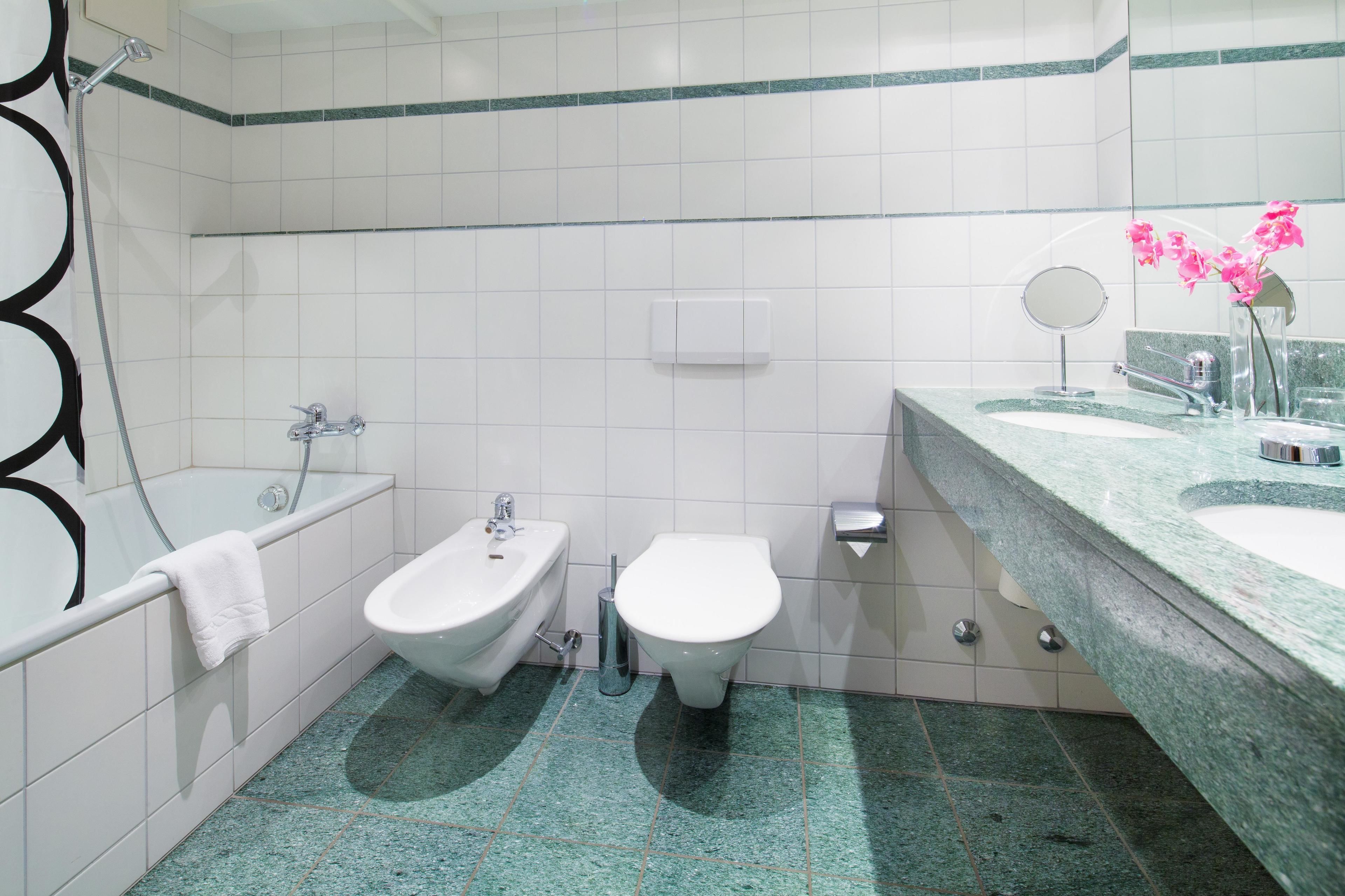 family room, 1 bedroom, non smoking | bathroom | bathtub, hair dryer, bathrobes, slippers