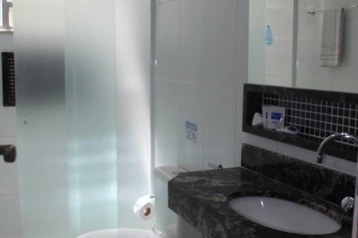 bathroom | shower, hair dryer, towels