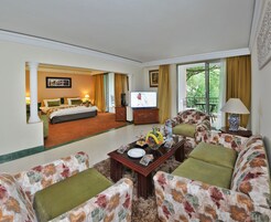 Suíte júnior | Roupas de cama premium, frigobar, escrivaninha, Wi-Fi de cortesia