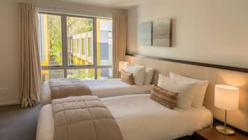 Executive Townhouse, 4 Bedrooms | Hypo-allergenic bedding available, pillowtop beds, desk, blackout drapes