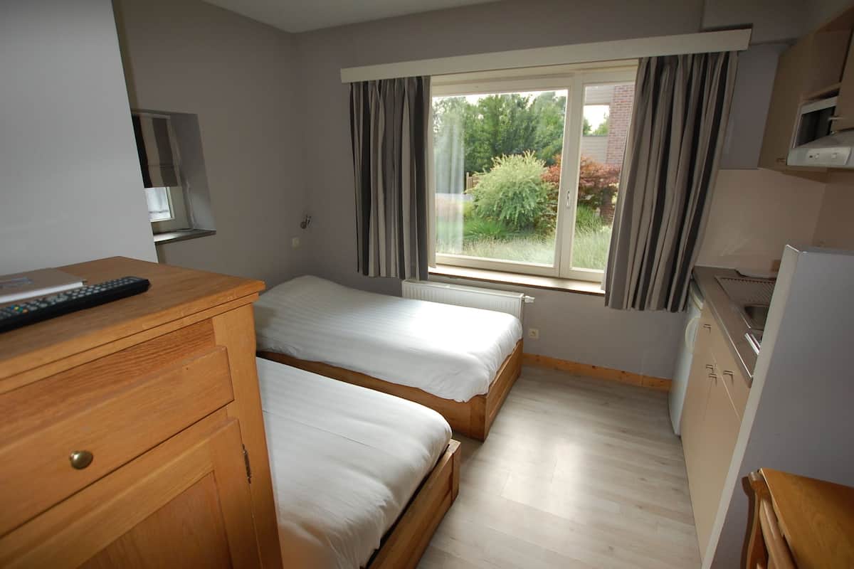 Twin Room, Ground Floor | 1 bedroom, individually decorated, individually furnished