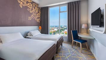 Ropa de cama de alta calidad y minibar