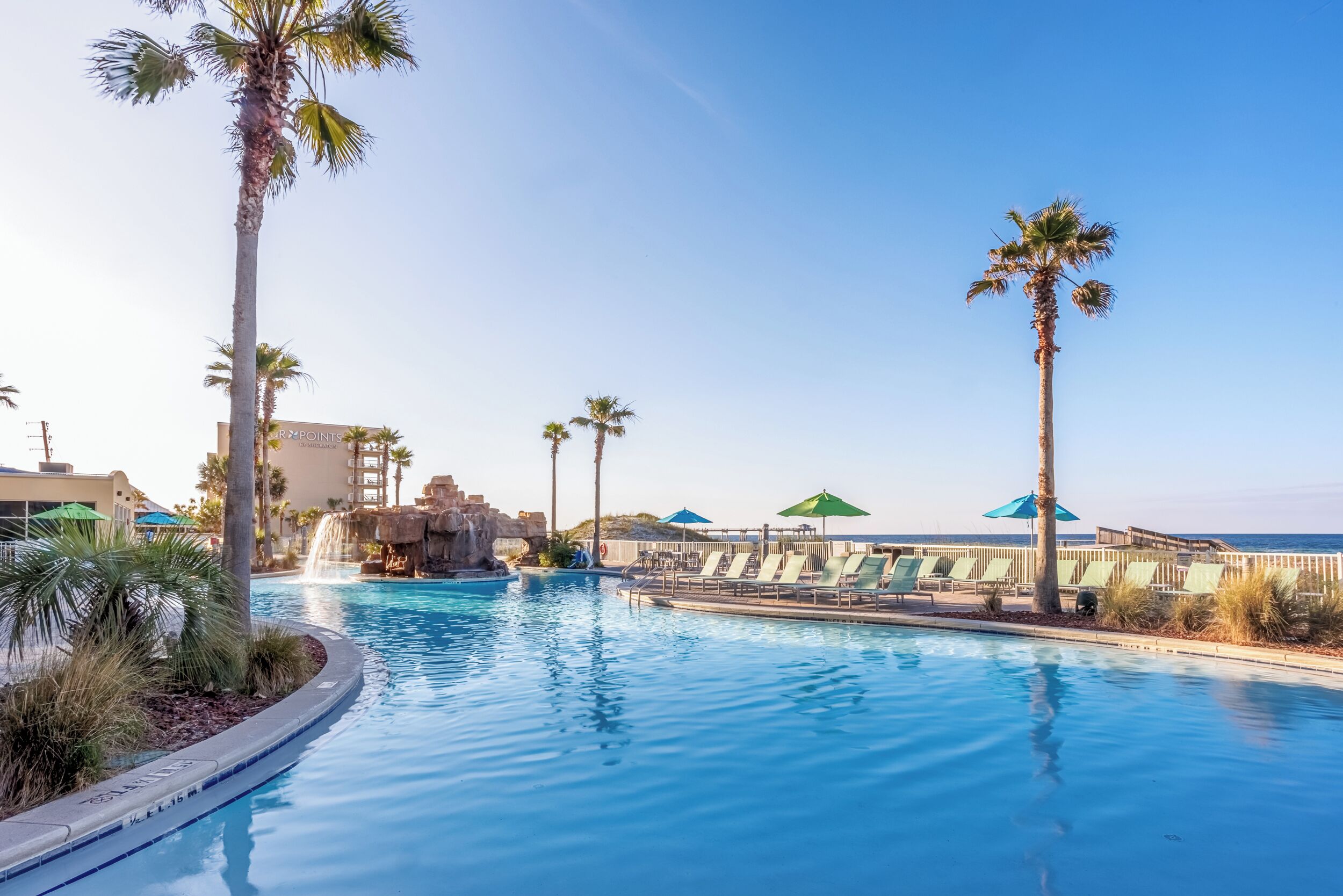 Indoor pool, outdoor pool, pool umbrellas, sun loungers