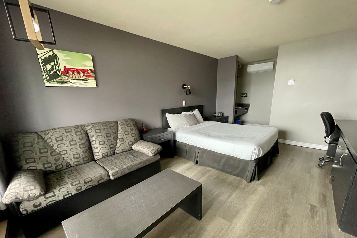 Desk, laptop workspace, blackout curtains, free WiFi