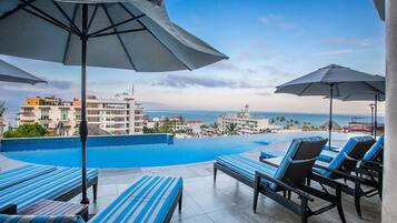 Outdoor pool, open 9:00 AM to 9:00 PM, pool umbrellas, sun loungers