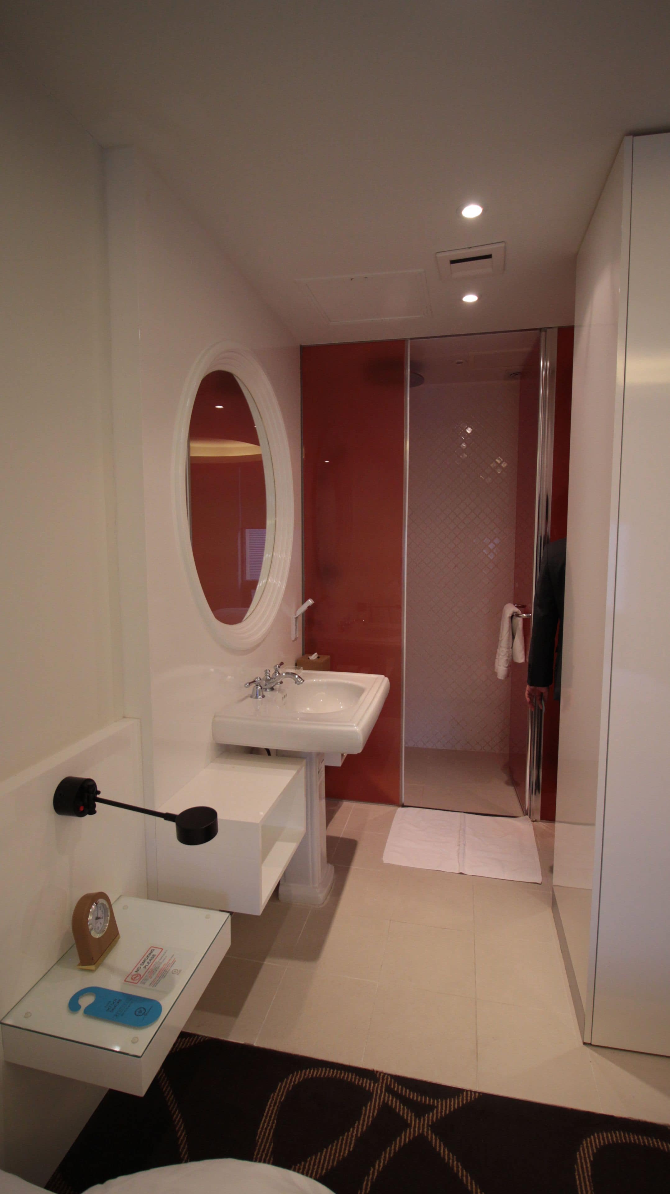 designer toiletries, hair dryer, bathrobes, slippers