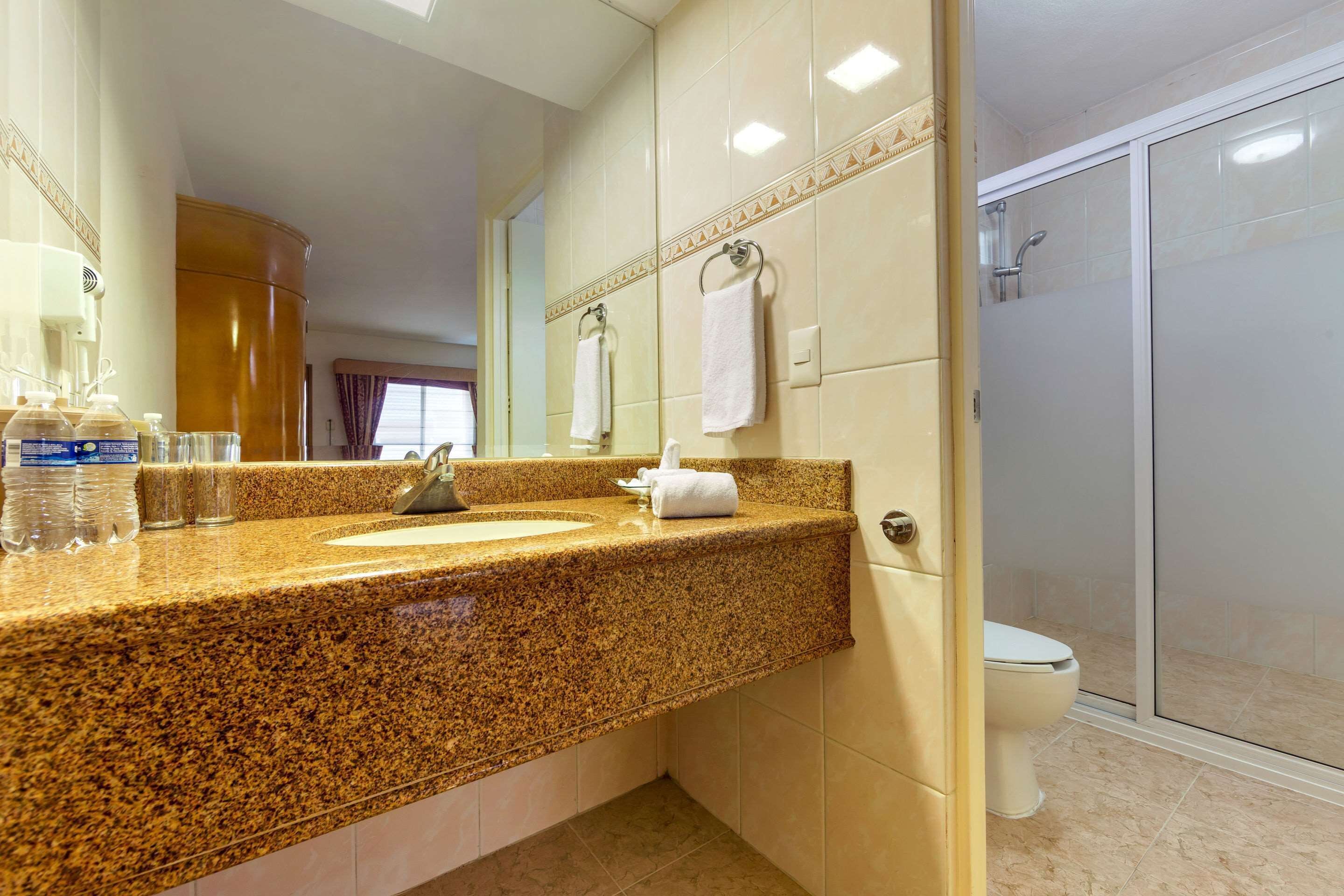 standard room, 2 double beds, non smoking | bathroom | combined shower/bathtub, hair dryer, towels