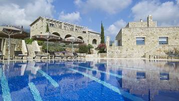 Seasonal outdoor pool, pool umbrellas, pool loungers