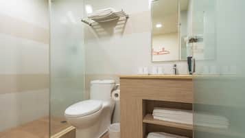 Shower, rainfall showerhead, hair dryer, towels