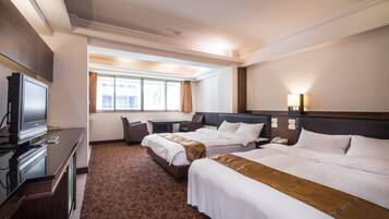 Family Room | Down comforters, individually decorated, blackout drapes