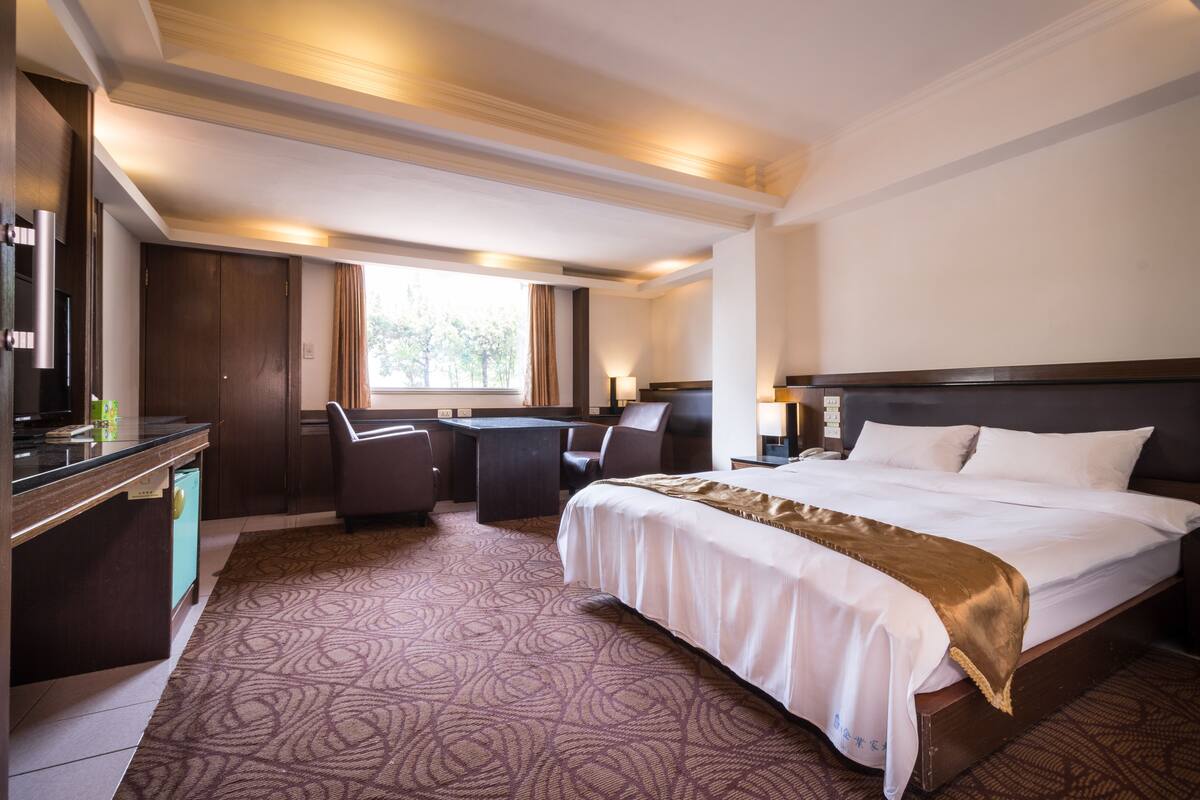Superior Double Room | Down comforters, blackout drapes, individually decorated
