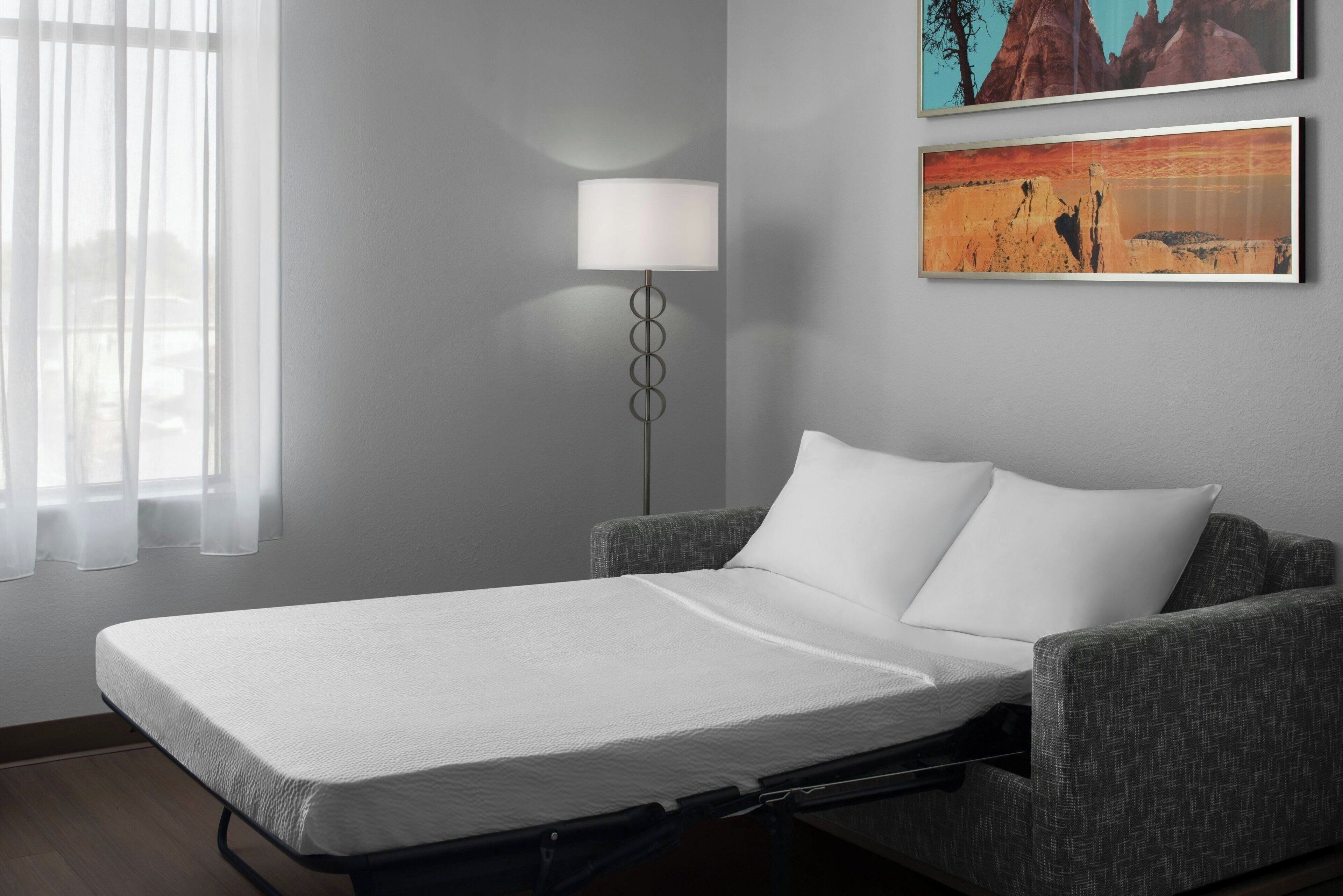 1 bedroom, hypo-allergenic bedding, down duvets, blackout curtains