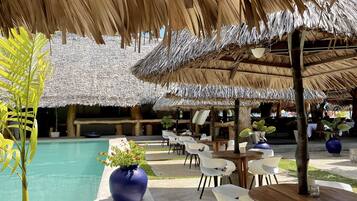 Outdoor pool, pool umbrellas, sun loungers