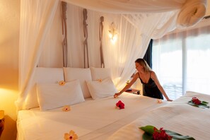 Signature Room | Egyptian cotton sheets, premium bedding, down comforters