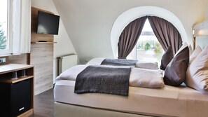 Minibar, escritorio, cortinas blackout y camas plegables/adicionales 