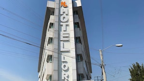 A tall building with the sign "HOTEL" prominently displayed. - Hotel Lord - Adults Only (Mexico City)