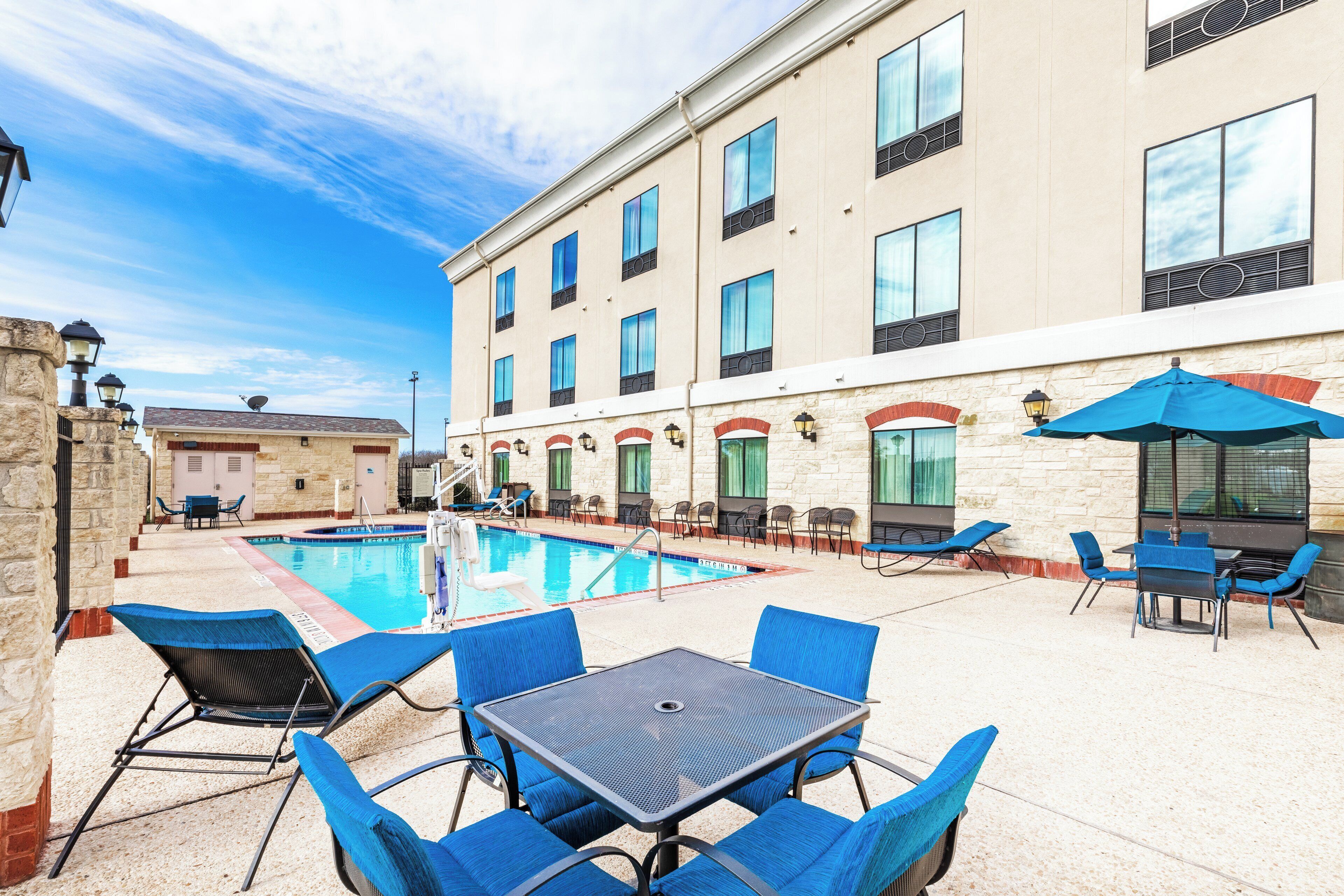Outdoor pool, open 10:00 AM to 10:00 PM, pool umbrellas, pool loungers