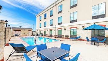 Outdoor pool, open 10:00 AM to 10:00 PM, pool umbrellas, pool loungers