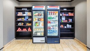 A vending machine area with snacks, sundries, and beverages.
