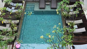 Outdoor pool, open 7:00 AM to 7:00 PM, sun loungers