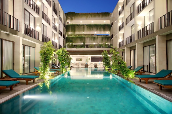 Outdoor pool, open 7:00 AM to 7:00 PM, sun loungers