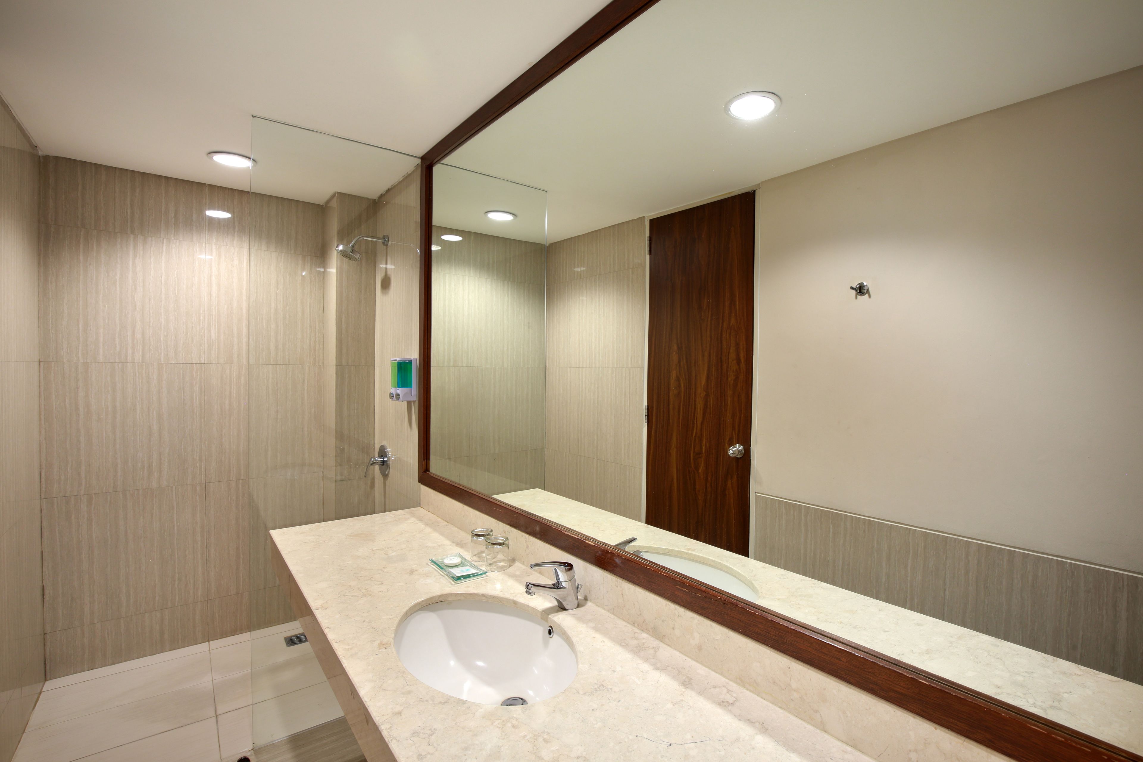 premier room | bathroom | shower, free toiletries, hair dryer, slippers