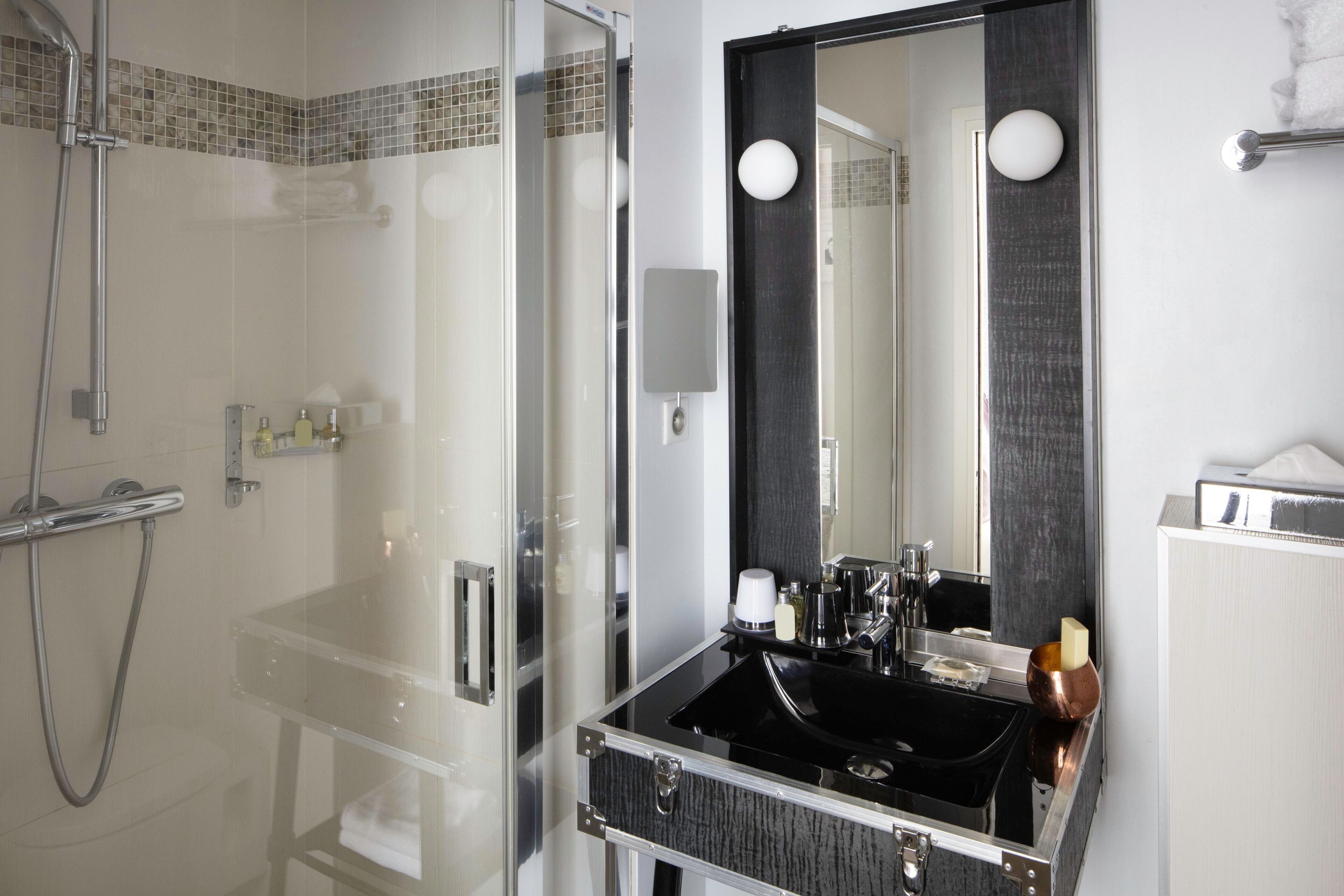 standard twin room - complimentary soft minibar, chromecast - snacks, digital press, fitness access | bathroom | shower, free toiletries, hair dryer, bathrobes