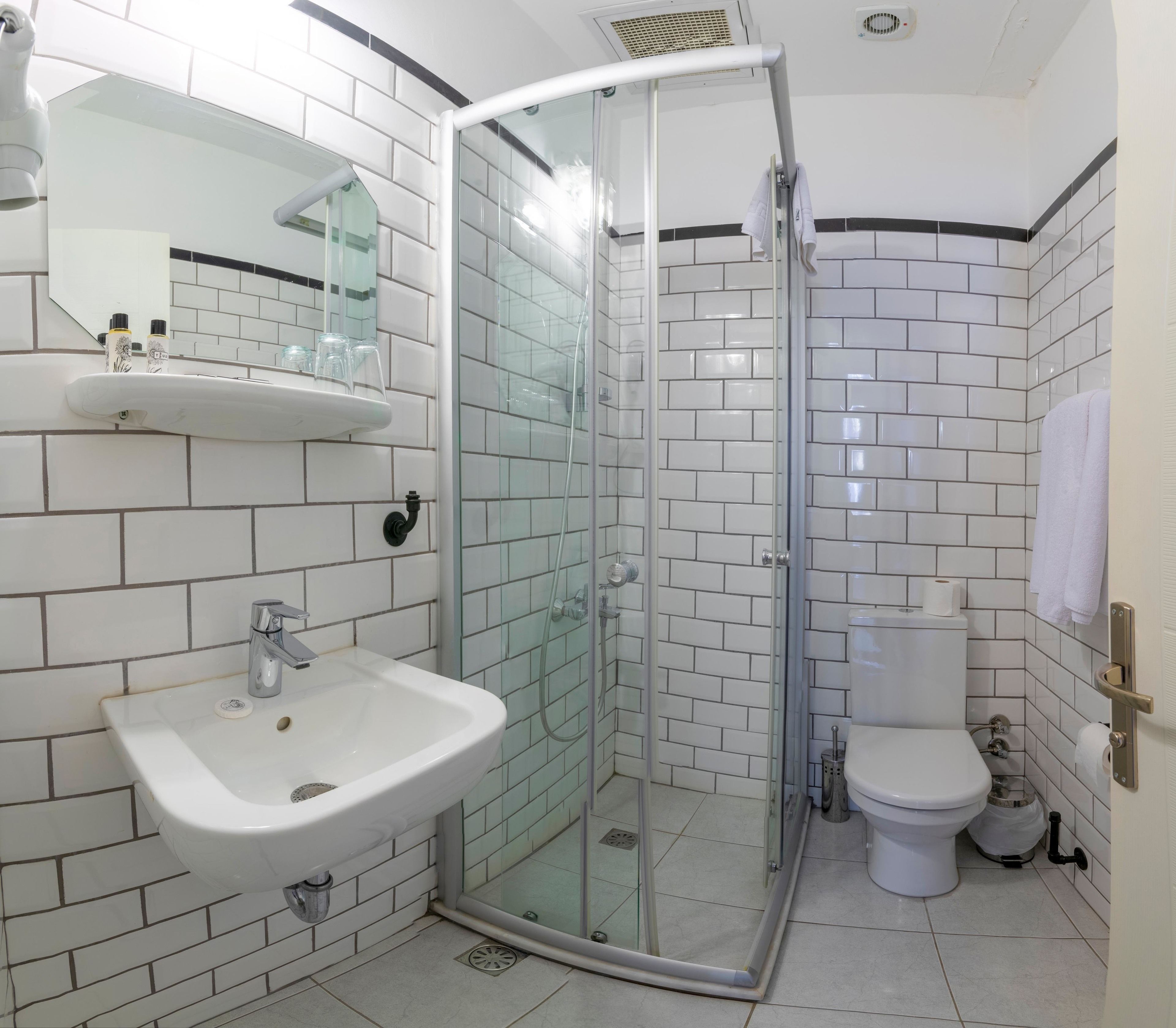 shower, free toiletries, hair dryer, slippers