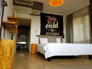 Suite Familiale, 2 chambres, vue partielle sur la mer | Literie de qualité supérieure, coffres-forts dans les chambres