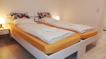 Wi-Fi de cortesia, roupa de cama