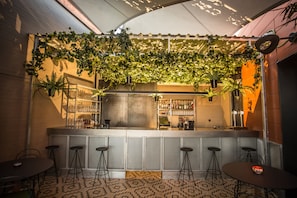 Rooftop bar, alfresco dining, open daily