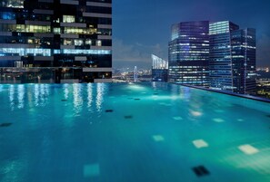 Outdoor pool, open 6:00 AM to 10:00 PM, pool umbrellas, sun loungers