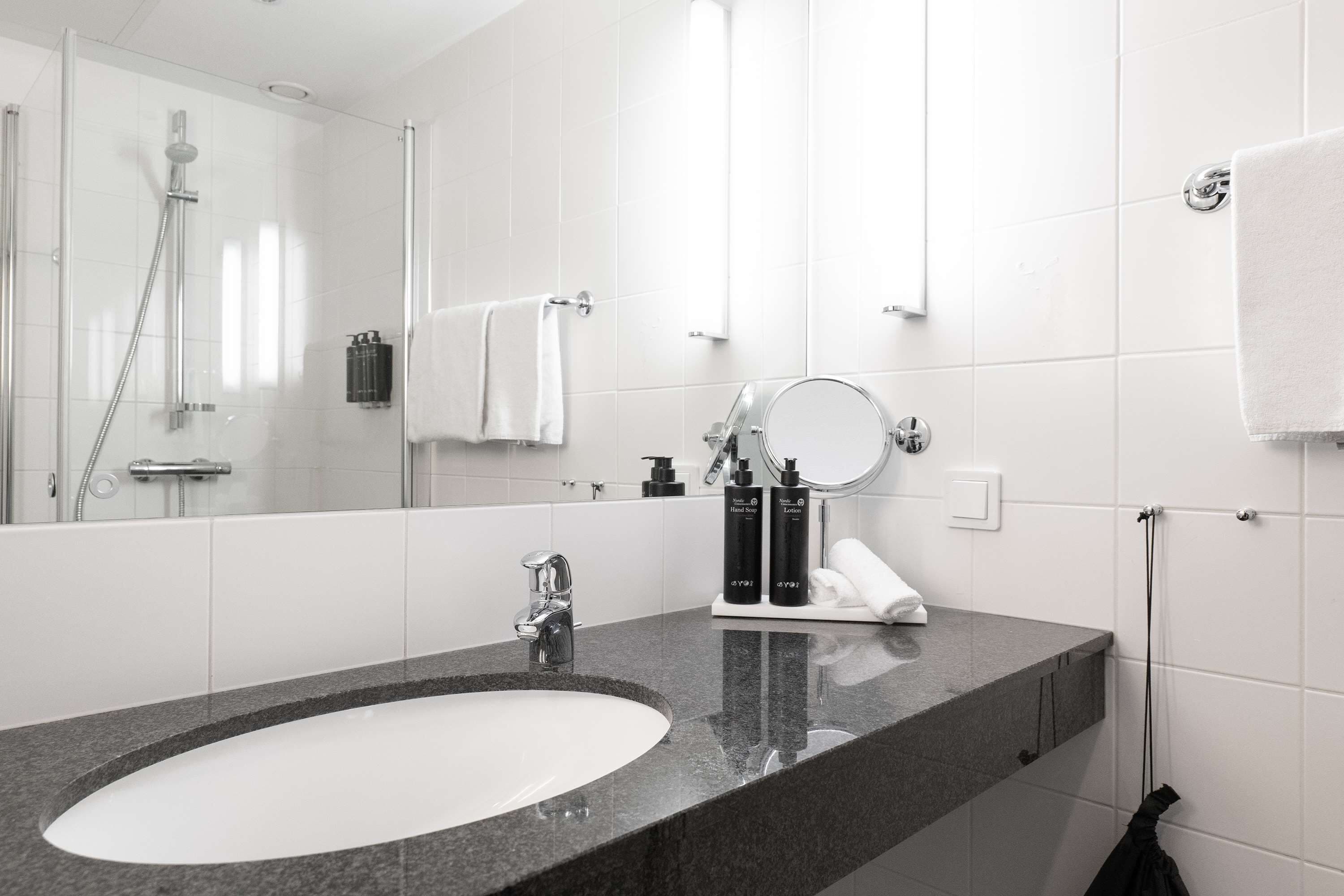 eco-friendly toiletries, hair dryer, heated floors, towels