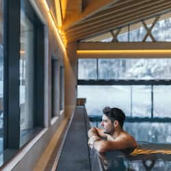 Indoor pool, outdoor pool, pool umbrellas, pool loungers