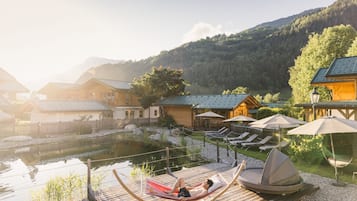 Indoor pool, outdoor pool, pool umbrellas, pool loungers