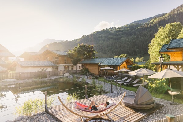 Indoor pool, outdoor pool, pool umbrellas, pool loungers