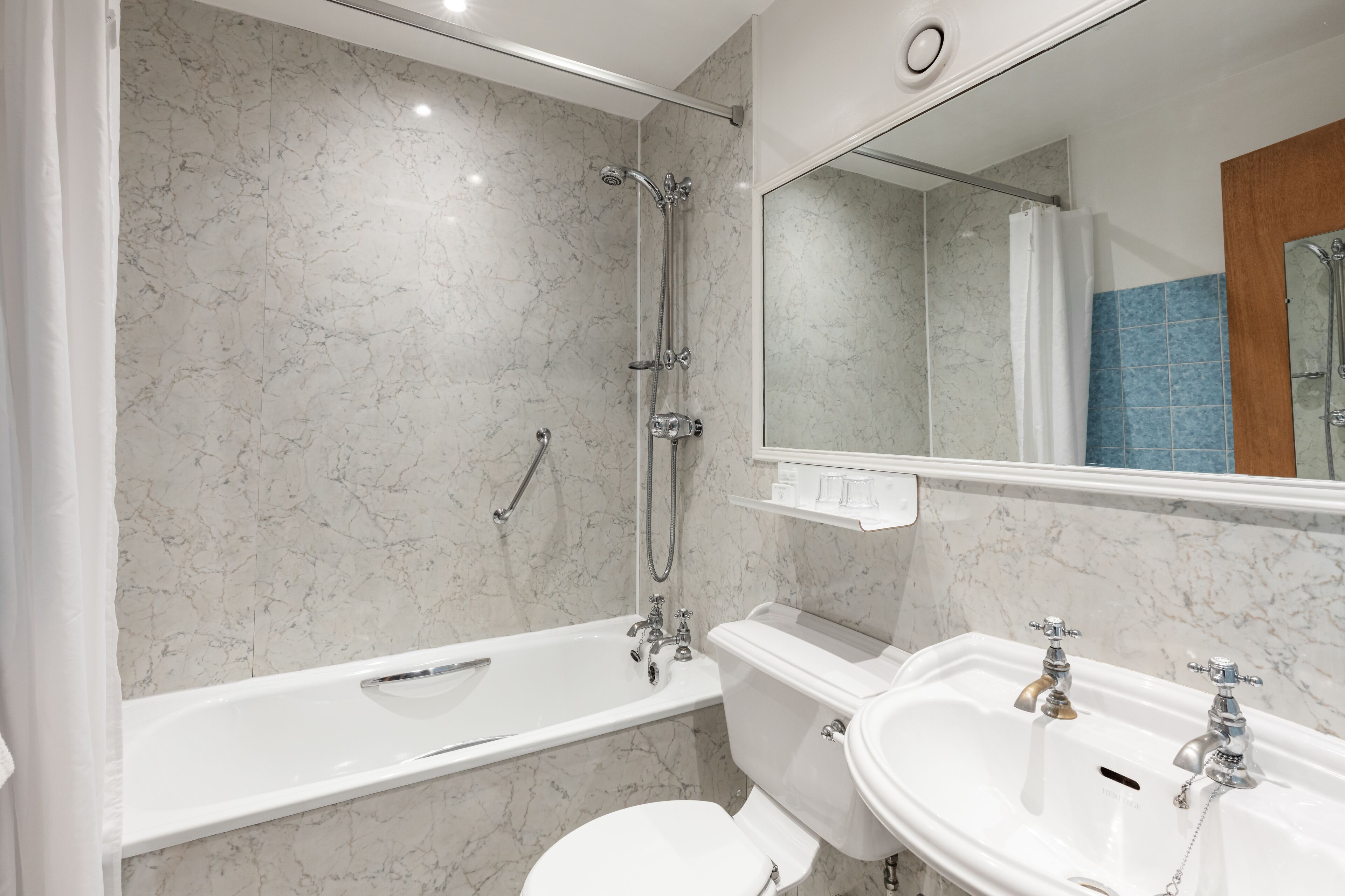 combined shower/bathtub, free toiletries, hair dryer, bathrobes